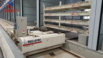 Cărucior automat de transfer feroviar